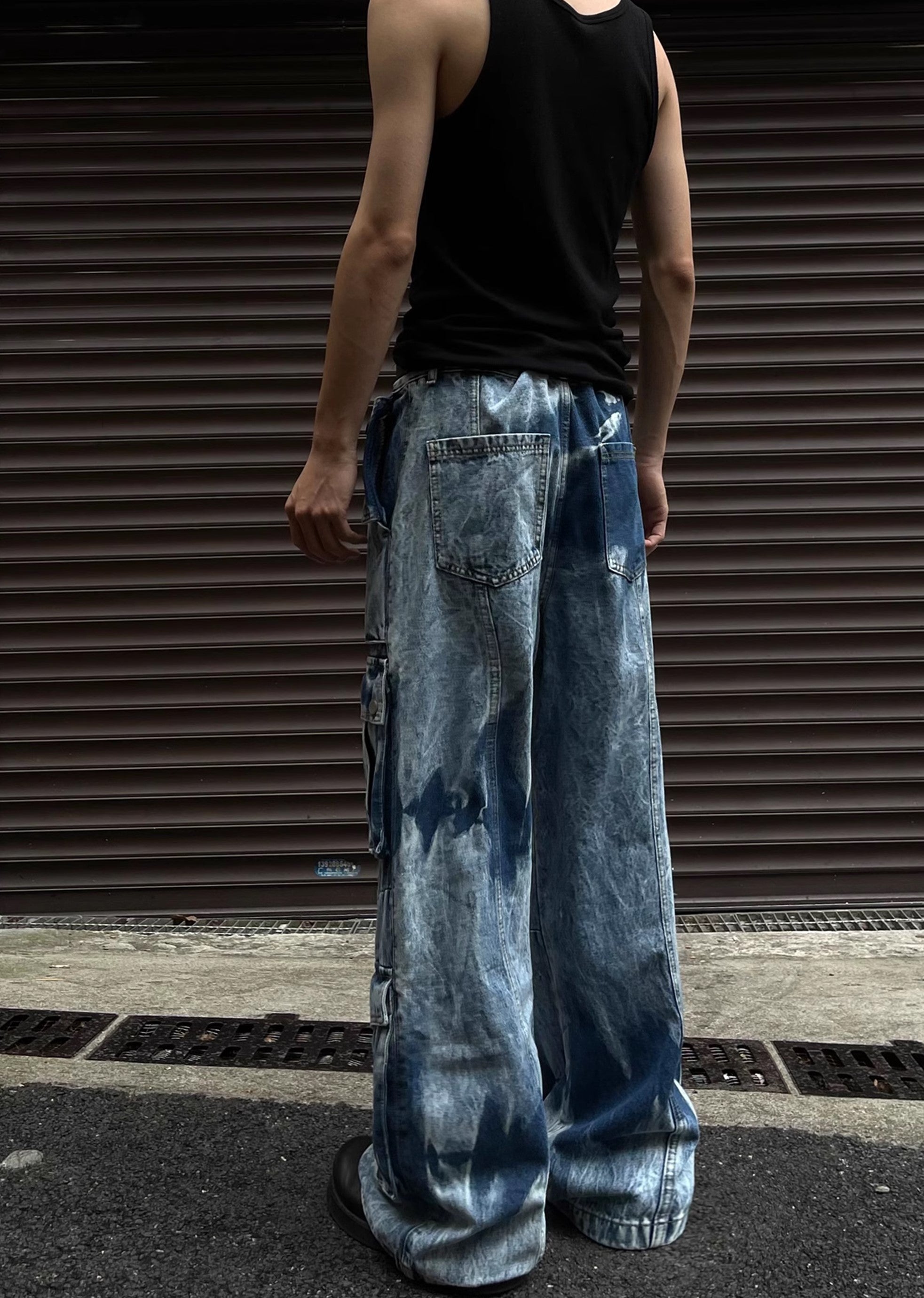 Random wash processing gimmick design blue denim pants